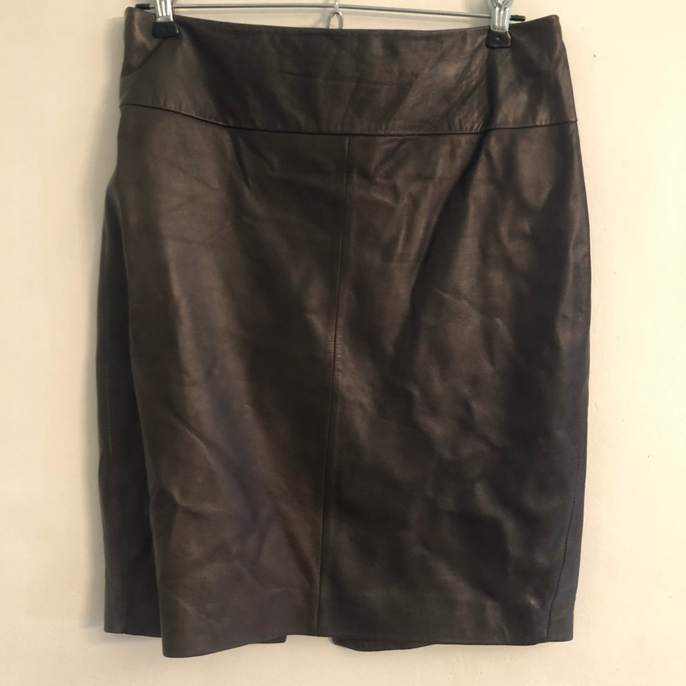 Caché dark brown leather skirt 29” waist.  Less wrinkly than in pix